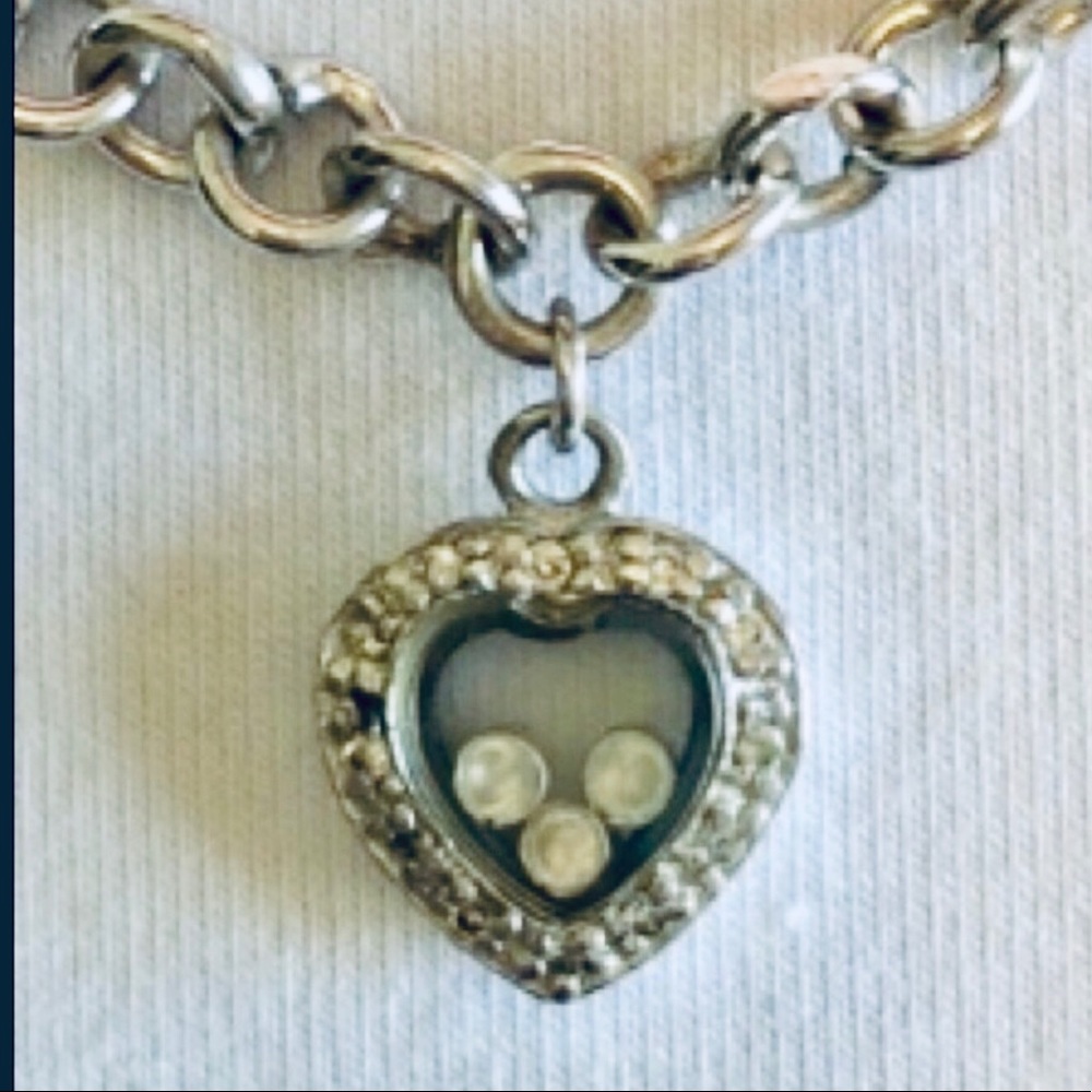 Silver toned heart necklace with crystal beads on the interior of glass chain - Picture 7 of 11